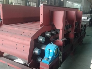 板式喂料机导料装置结构设计