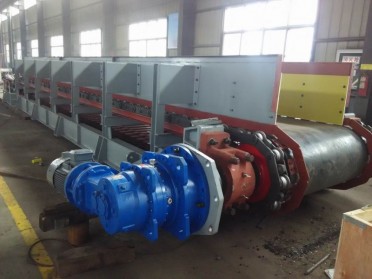 板式给料机头部清扫器的技术应用